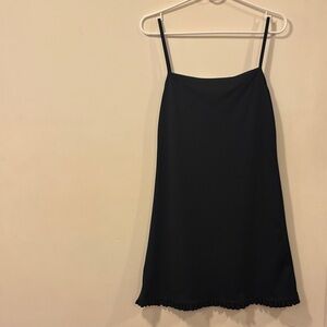 South Beach Minimal Black Mini Slip Skirt with Ruffle Hem perfect black dress!